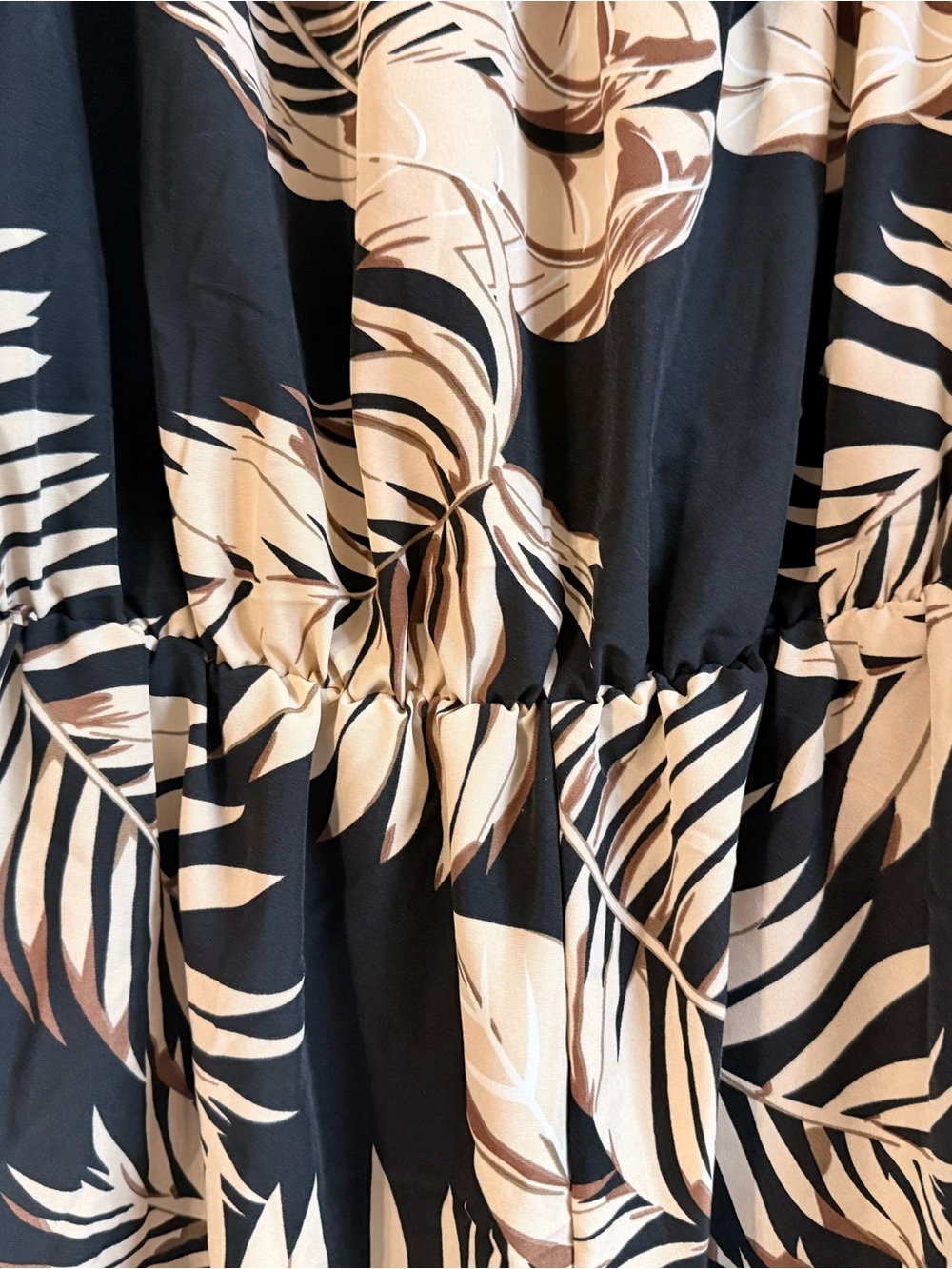 Lizzie’s Boutique Off-Shoulder Black and Beige Tropical Print Romper - Picture 11 of 13
